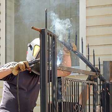 man installing a gate